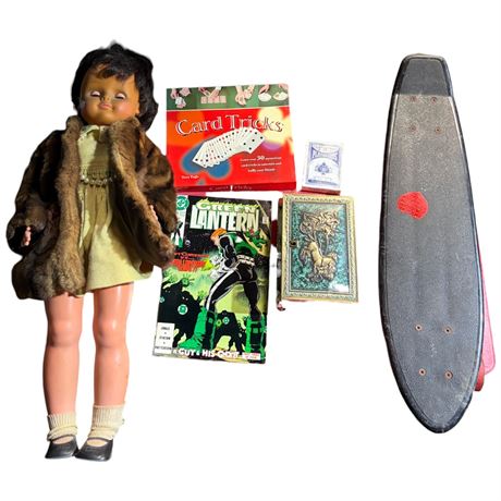 Box Full Of Assorted Collectibles, Doll, Skateboard, Etc..
