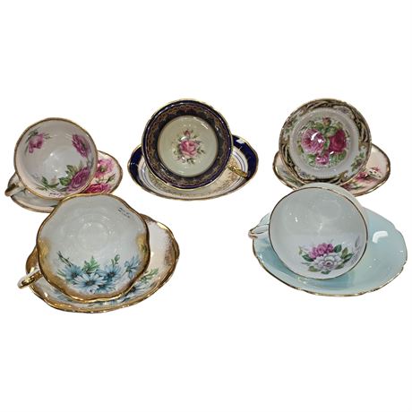 5 Assorted Tea Cups And Saucers