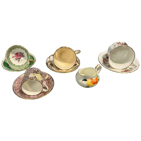 9 Pieces Of Paragon Tea Cups & Saucers, Creamer