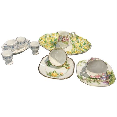 11 Assorted Royal Albert Tea Cups, Creamer, Plates, Etc..